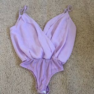 Plunging V neck bodysuit